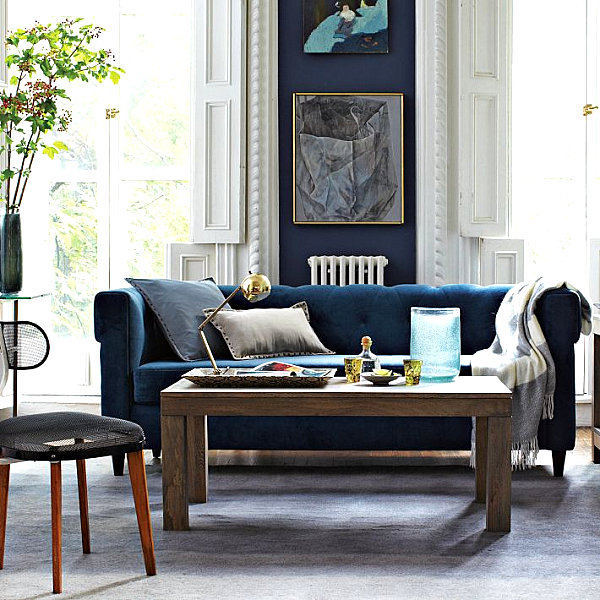 Blue-tufted-upholstered-sofa